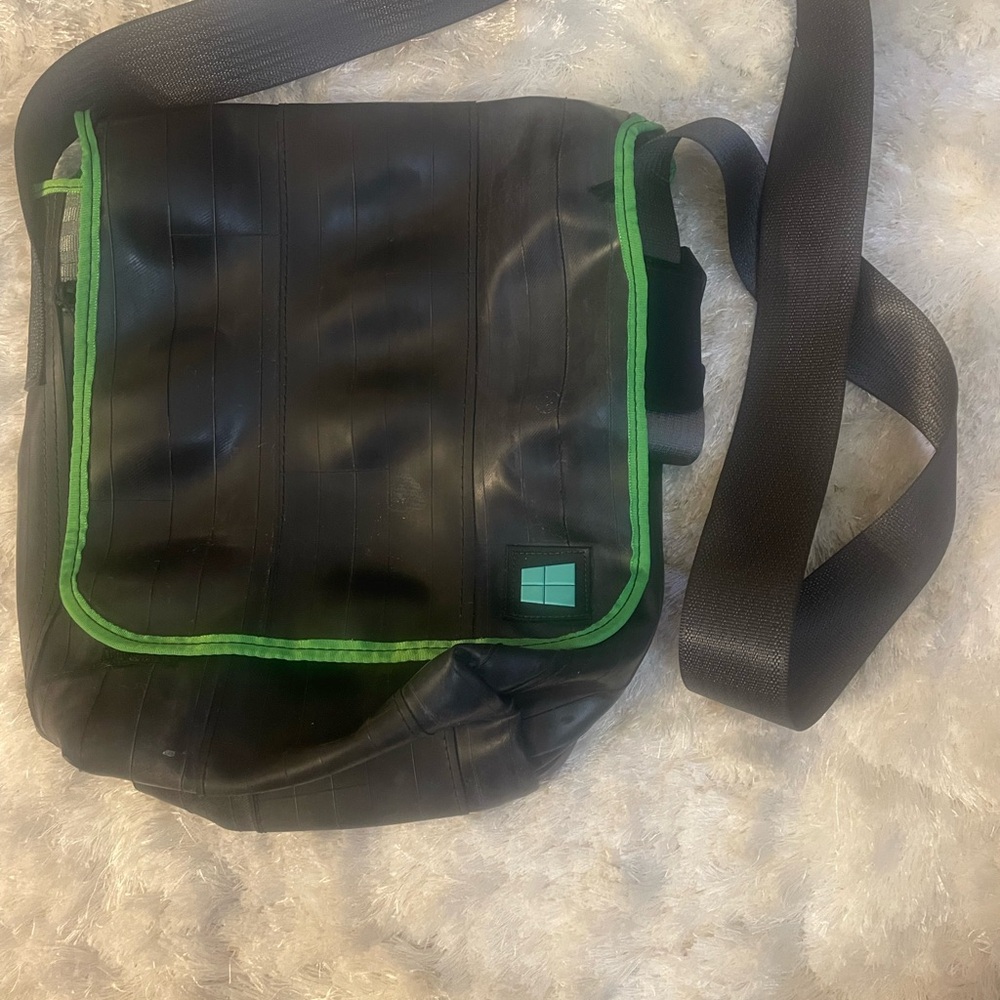 Black and Green Messenger Bag with Durable Design
